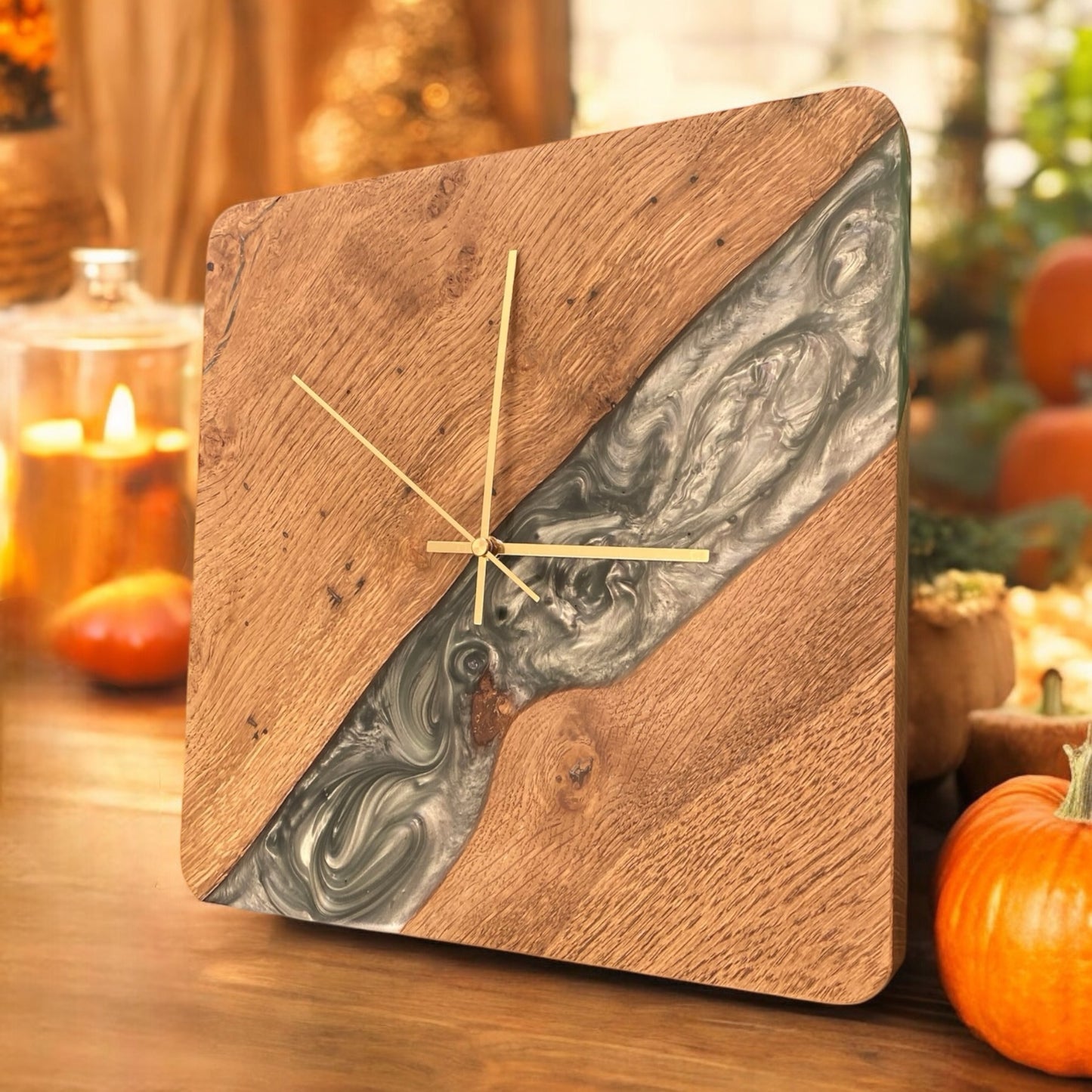 Side view of the wall clock, showcasing the sage green resin river from a different angle.