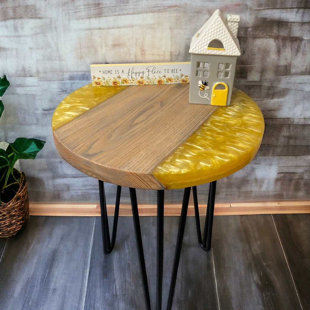 an oak and yellow resin table top, the resin features a beautiful flowing swirl patter. photo for colour example only