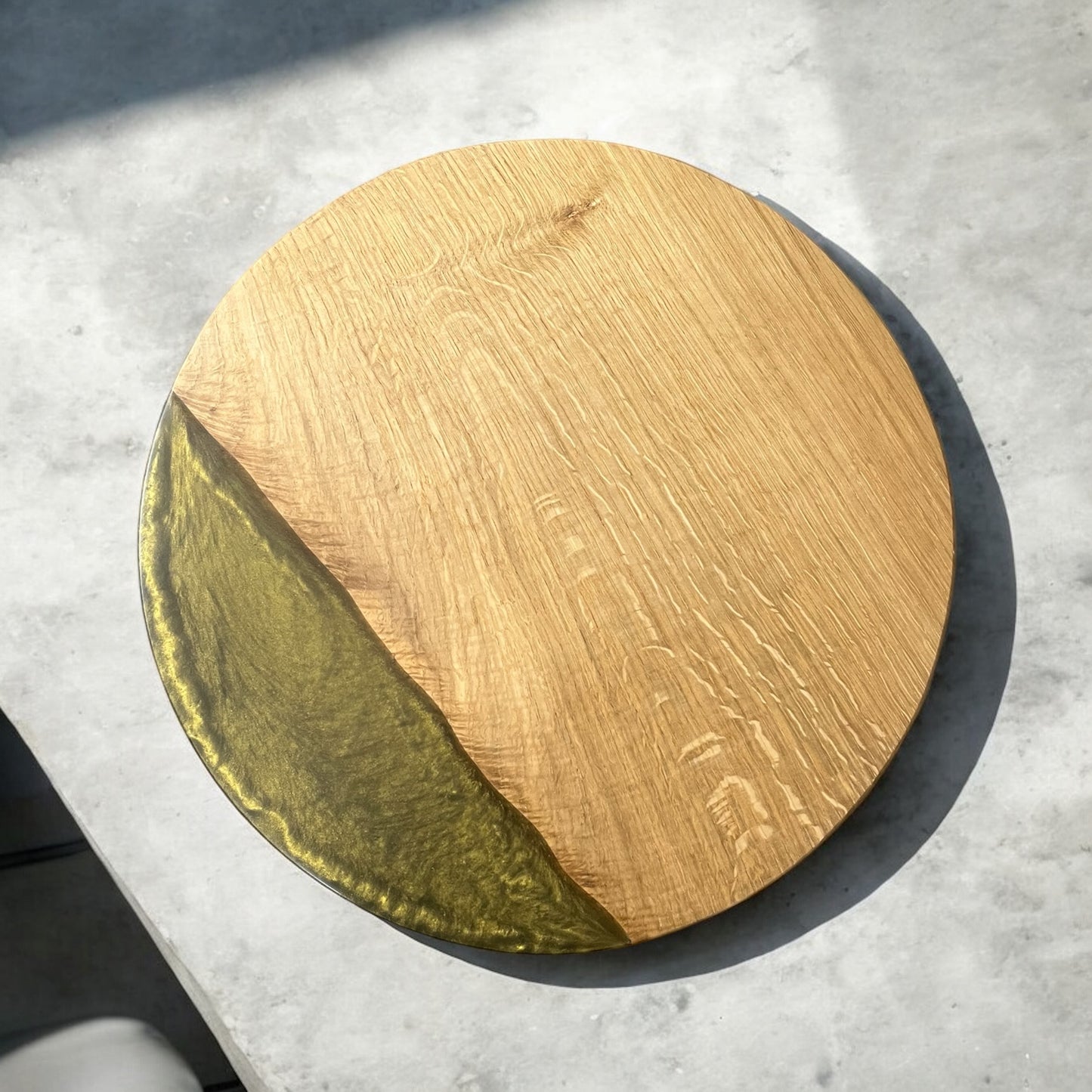 A stunning top-down view of the oak and epoxy resin end table, featuring a deep olive gold resin front edge design, making it more visible when in use.