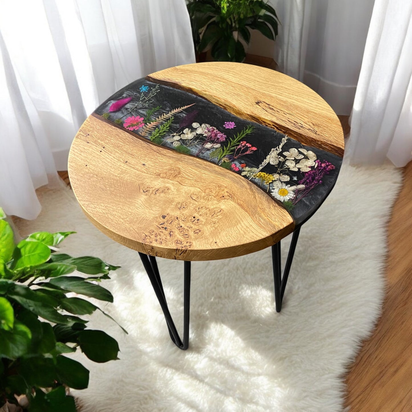 Left-side perspective of the oak and resin end table, emphasizing the detailed floral design and polished craftsmanship.