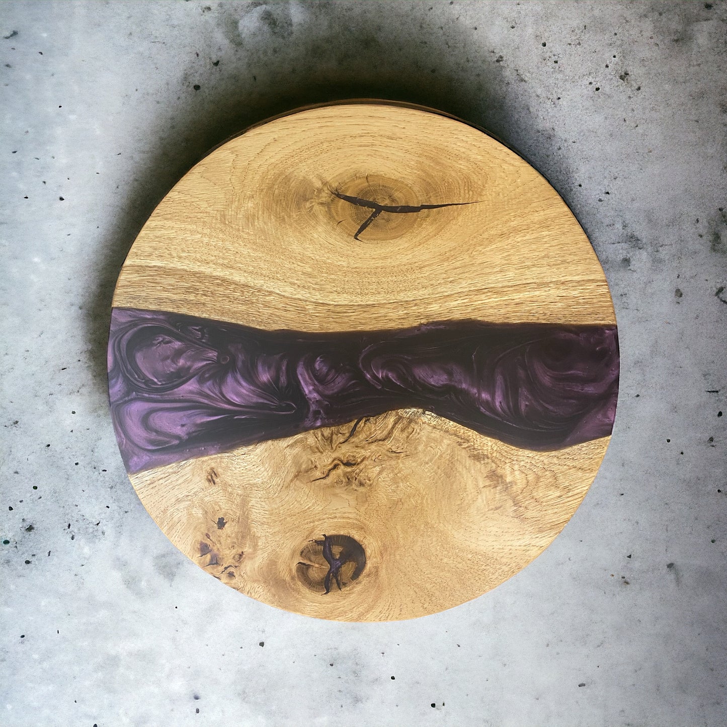 Top view of the oak and deep purple epoxy resin circle that can be used as a table top, centrepiece or a clock face, showcasing the natural wood grain and vibrant resin contrast.