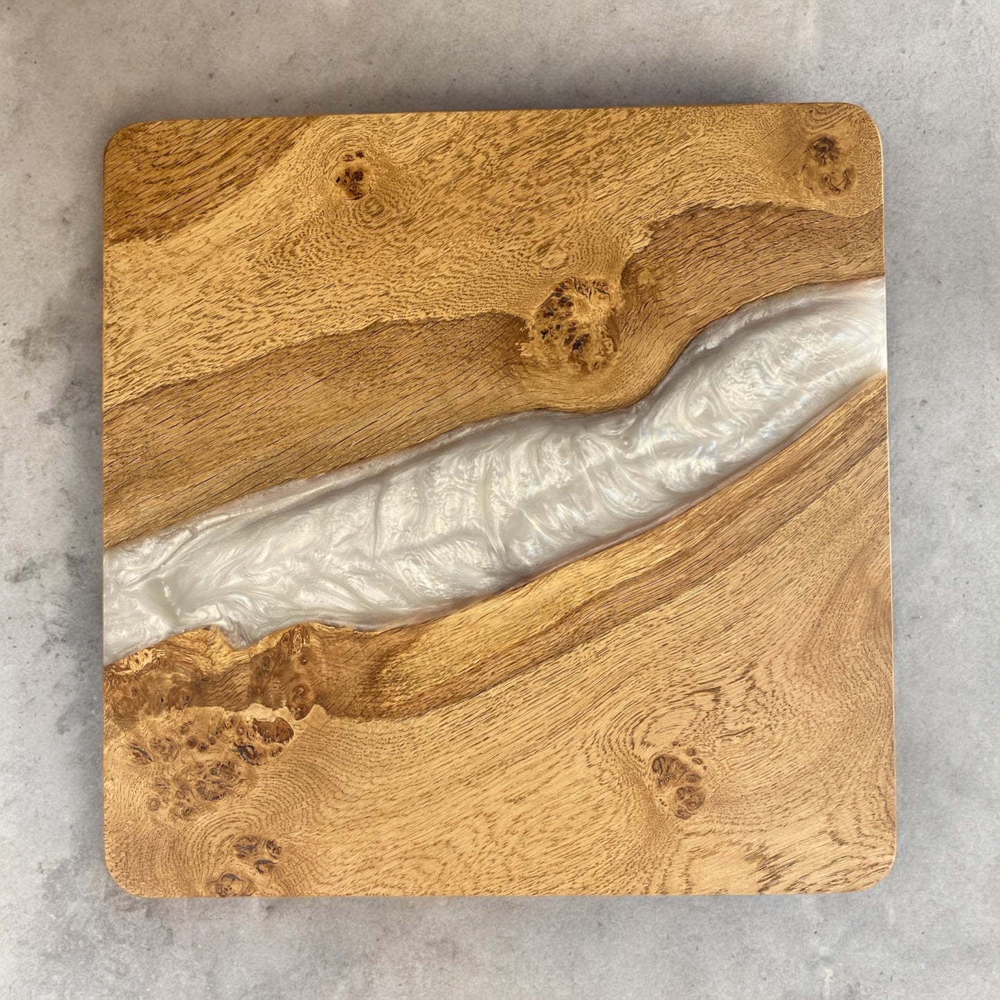Top view of the oak and white epoxy resin square end table, showcasing the natural wood grain and sleek resin finish.