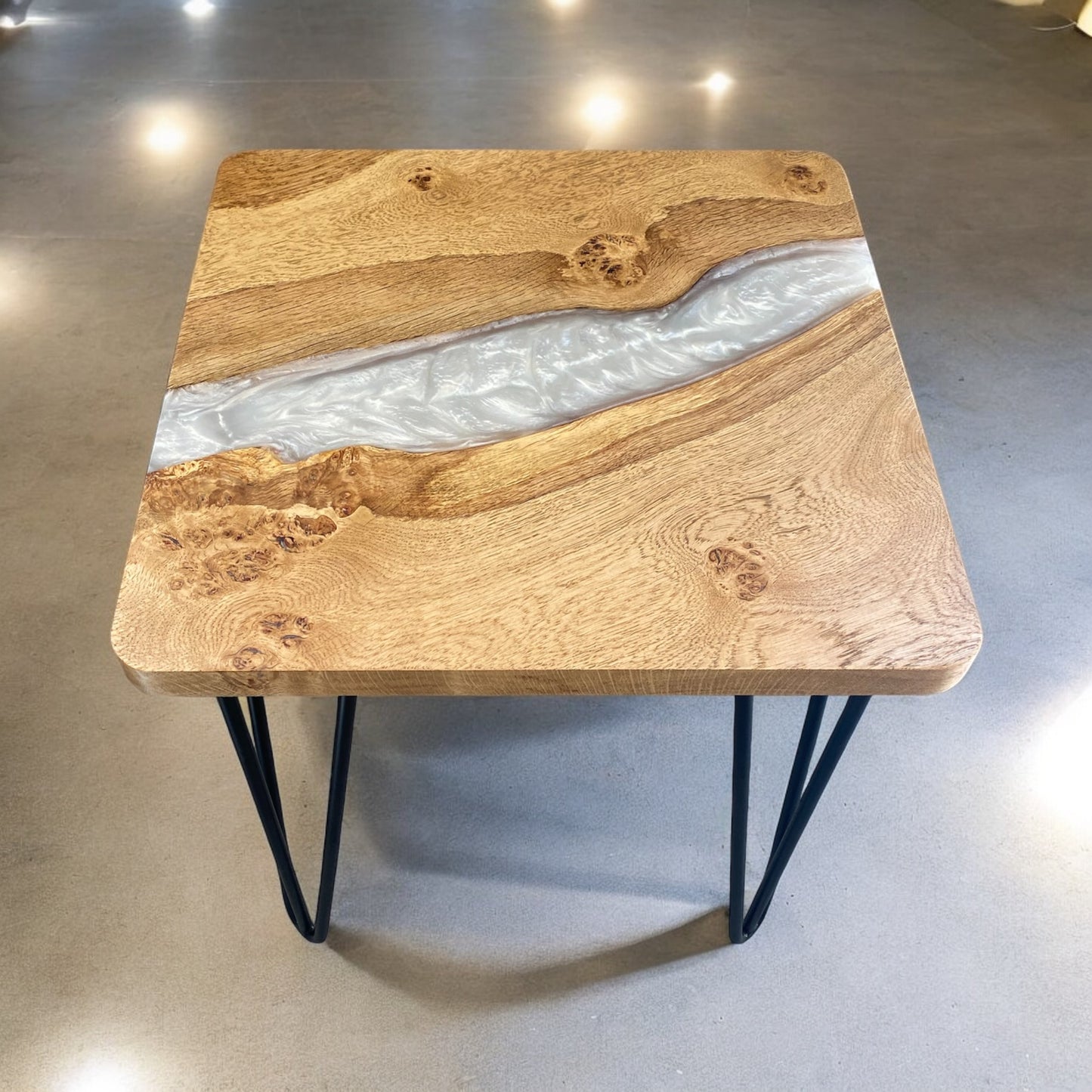 Front view of the handmade square end table, highlighting the sturdy oak legs and smooth table top.