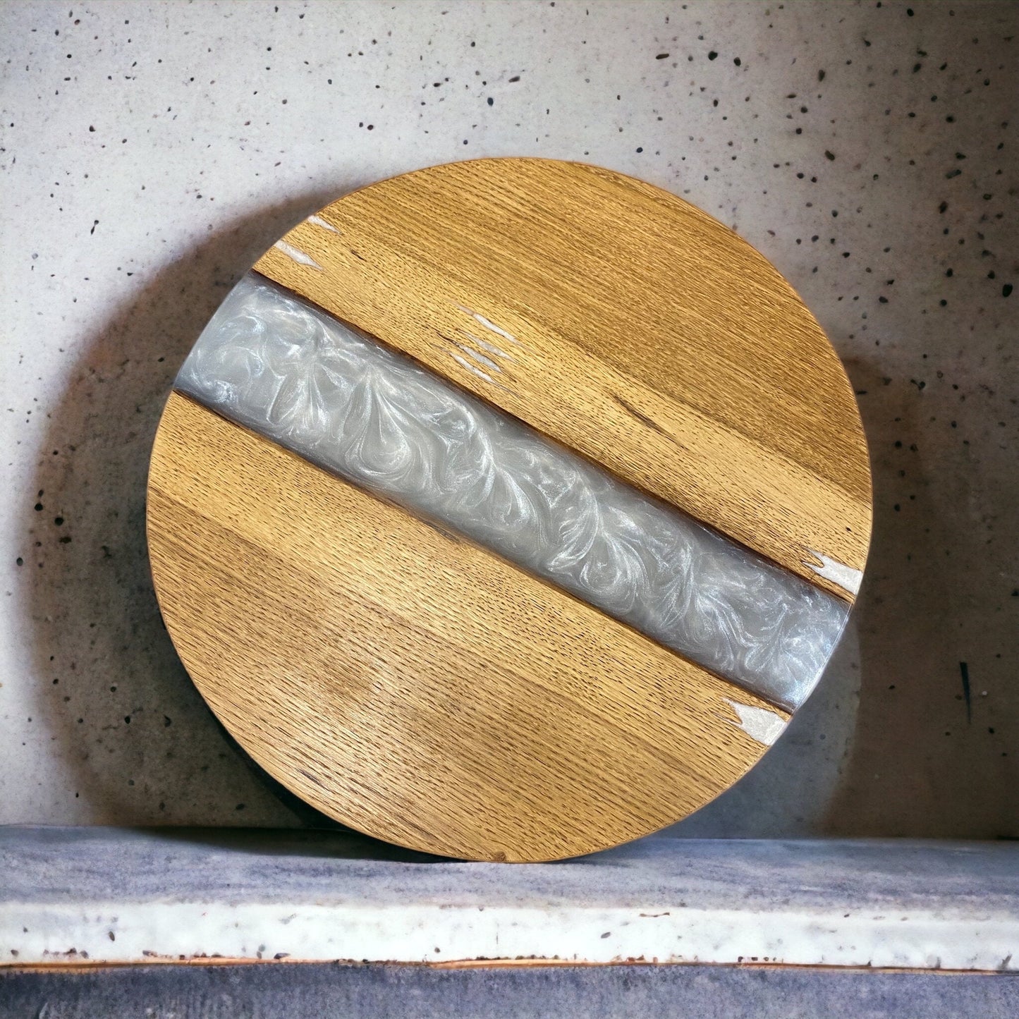 A top-down view showcasing the natural oak grain beautifully contrasted by the glossy pearl white resin.